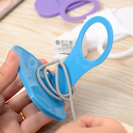 Phone holder for wall socket