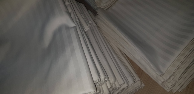 Oteller için yatak çarşafları.