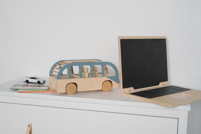 wooden bus with passengers on magnets
