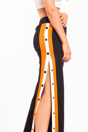 Широкие женские брюки с боковыми кнопками-