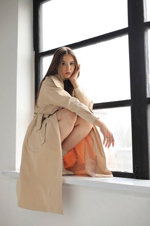 Yağmurluk pamuklu kumaştan yapılmış trençkot