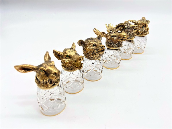 Shot glasses with the heads of beasts