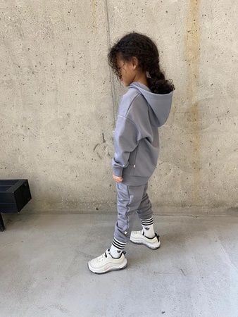 Children's suit with a hood.