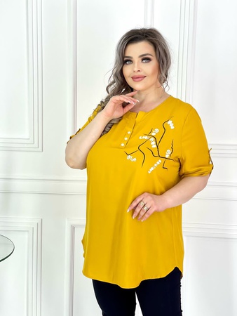 Блузки туники