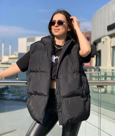 Женский пуховик без рукавов