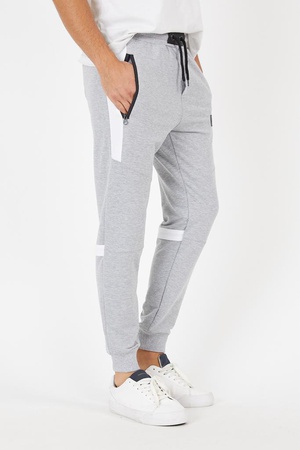 Fermuar cepli parça ve şerit detaylı eşofman altı