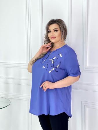 Блузки туники