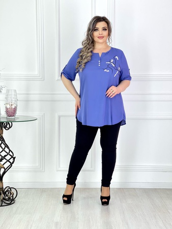 Блузки туники