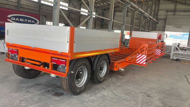 Трал низкорамный для перевозки пластиковых труб и Бочек из пластика диаметром до 5 метров