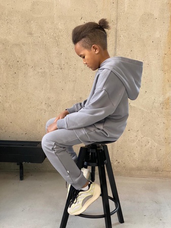 Children's suit with a hood.