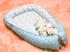 Кокон для новорождённого babynest
