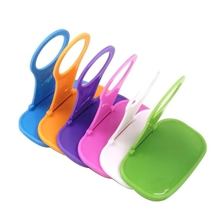 Phone holder for wall socket