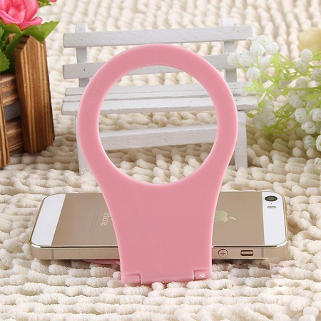 Phone holder for wall socket