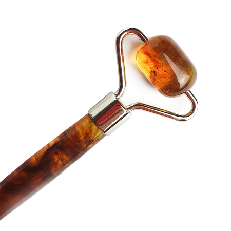 Роликовый массажер из янтаря