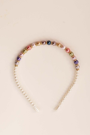 Корона из белого жемчуга с шайбой и жемчугом посередине