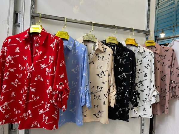 Женские блузки