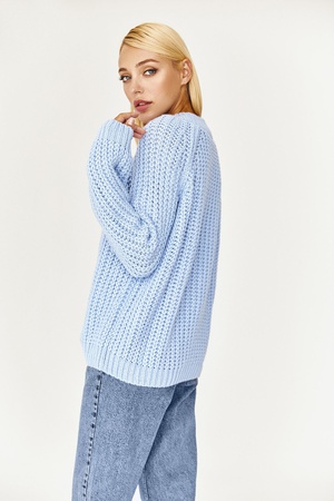 Women's sweater knitted with a pigtail heavenly