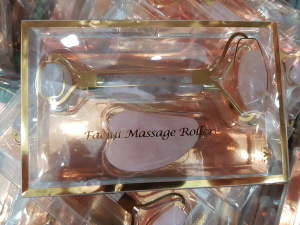 Facial rollers, travel hairdryer and hair straightener.