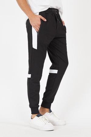 Fermuar cepli beyaz şerit ve parça detaylı şık eşofman altı