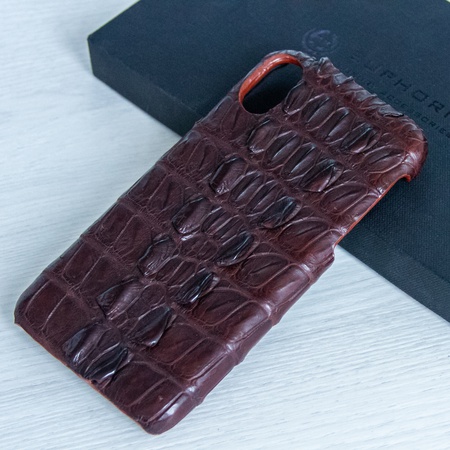 The iPhone X case is crafted from crocodile leather