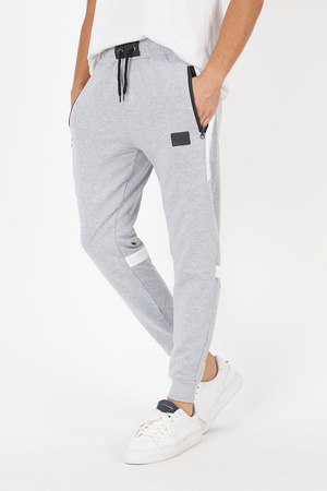 Fermuar cepli parça ve şerit detaylı eşofman altı