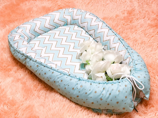 Кокон для новорождённого babynest