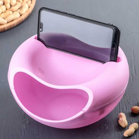 Telefon ve tohumlar, kuruyemişler, çeşitli atıştırmalıklar için kase standı