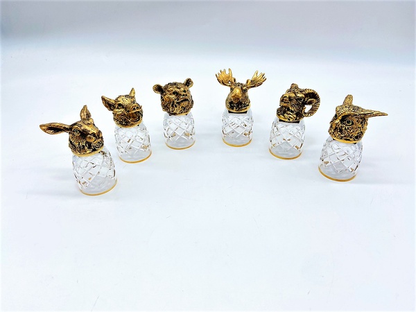 Shot glasses with the heads of beasts