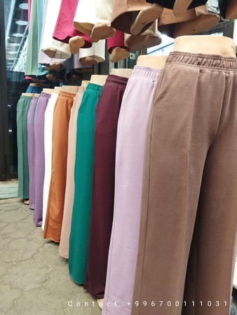 Женские одежды: брюки, трико, спортивные