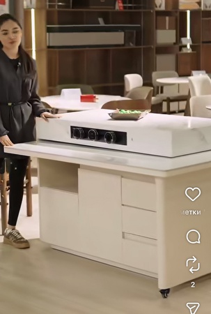 Kitchen island with pull-out table and storage drawers