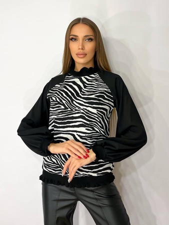 The blouse is stylish, combined