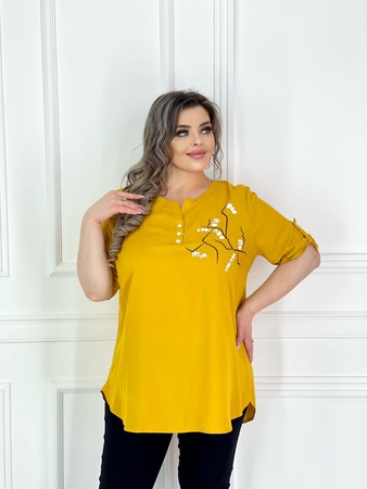 Блузки туники