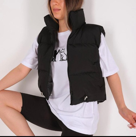 Женский пуховик без рукавов