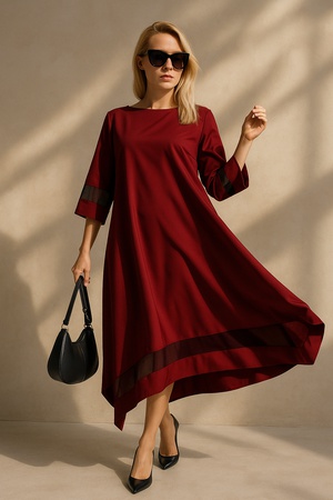 Элегантное женское платье свободного кроя с асимметричным подолом