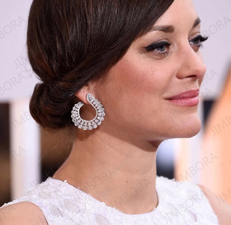 Серьги из ювелирного металла и цирконов