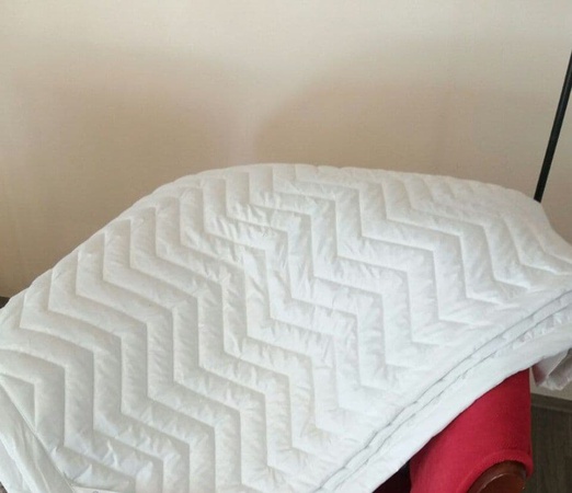 Постельные принадлежности и белье.