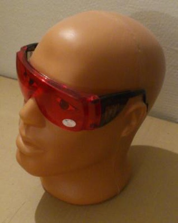 Safety glasses red-orange with a sliding arm