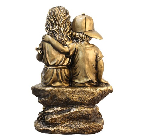 Heykelcik, çocuklar, bir kitap okuyor