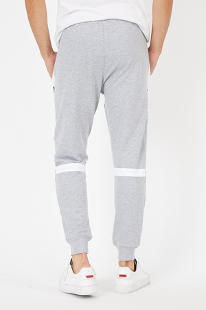 Fermuar cepli beyaz şerit ve parça detaylı şık eşofman altı