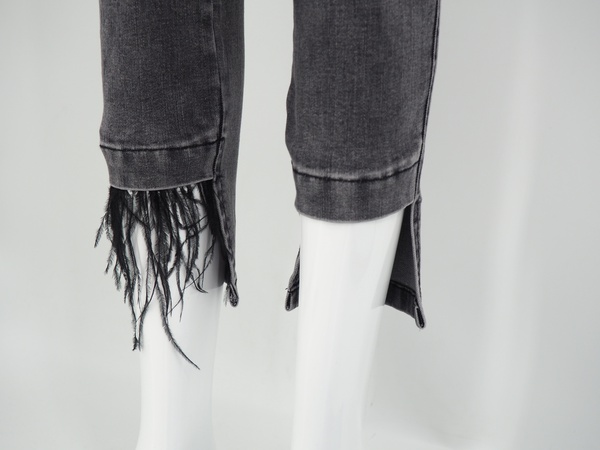 Denim with removal black feather